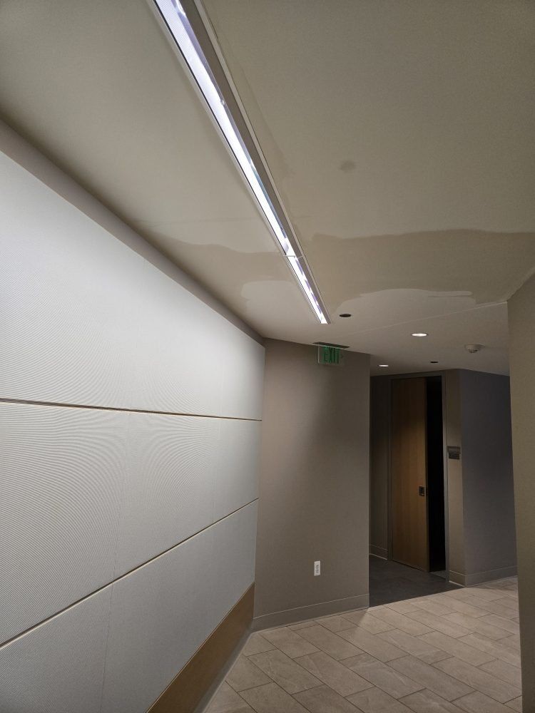 Commercial building corridor and elevator lobby during structural drying