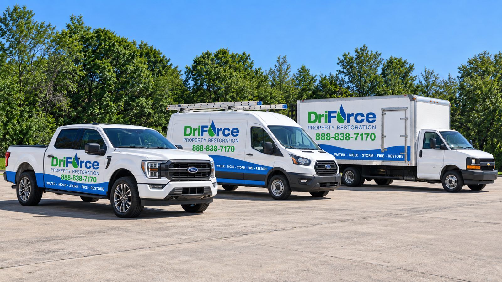 DriForce pickup, van and box truck staged for a commercial restoration response
