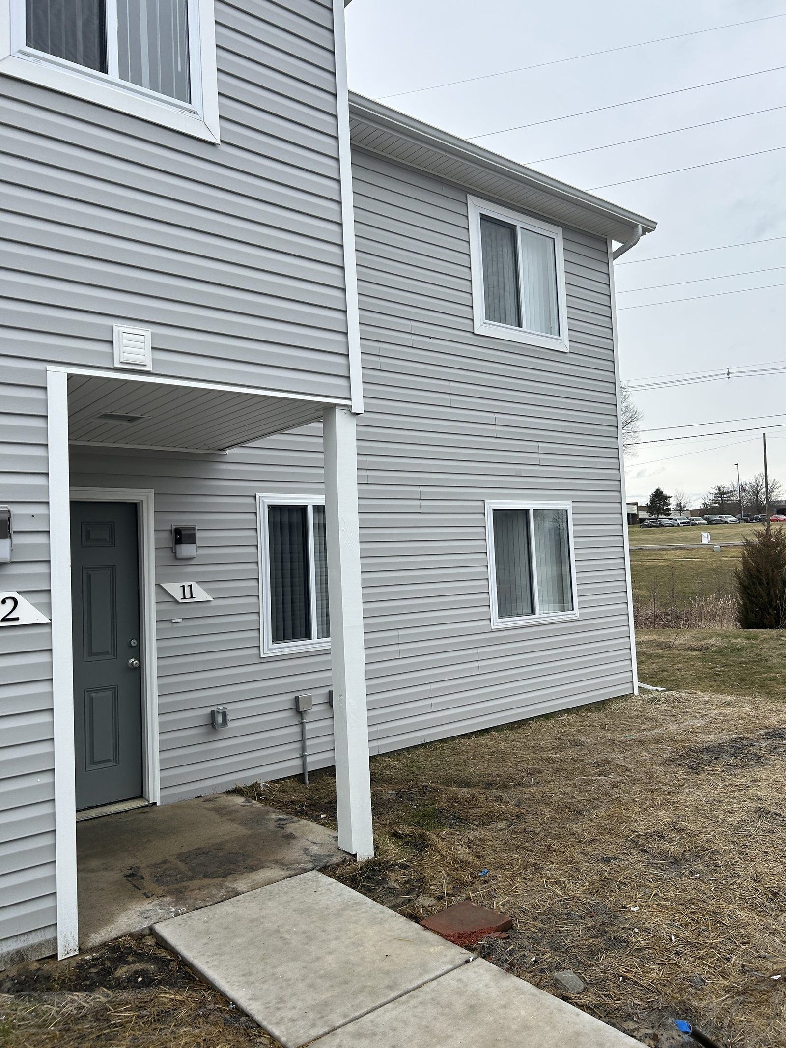 Completed multi-unit apartment exterior following DriForce fire restoration