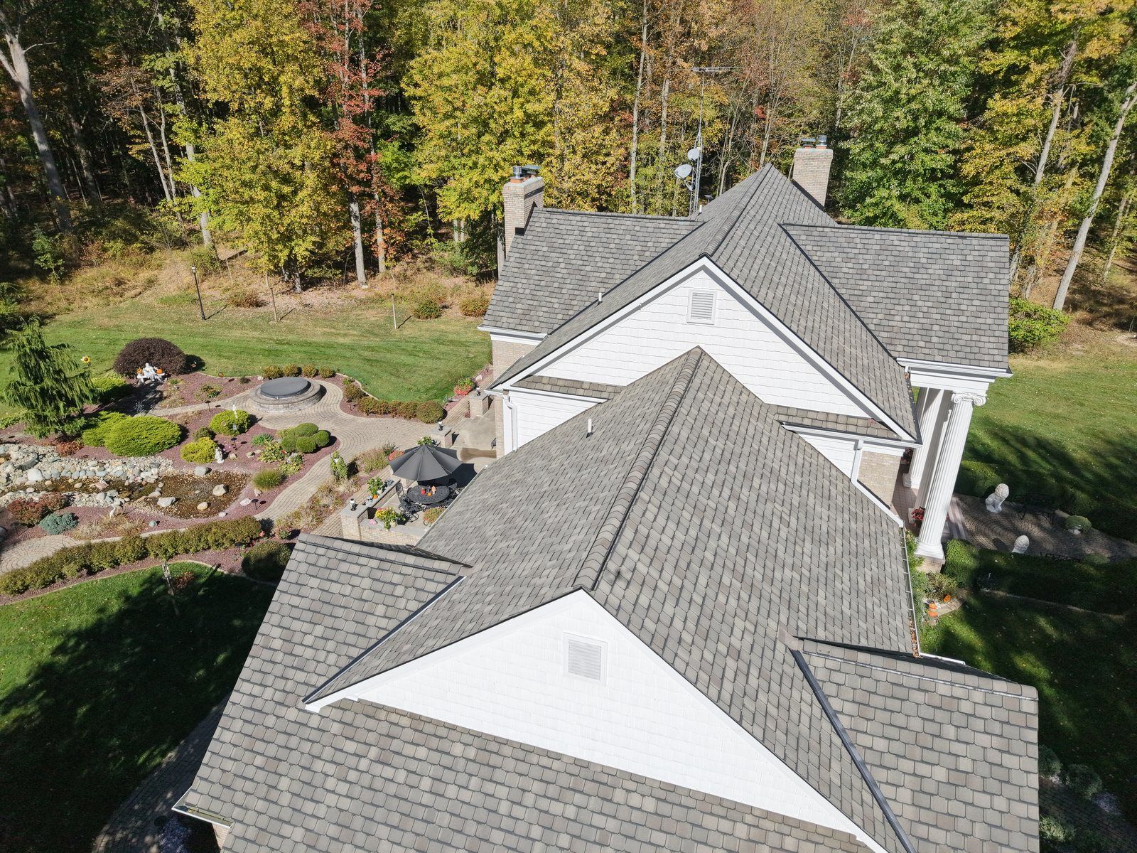 Roof replacement in progress on a Metro Detroit home