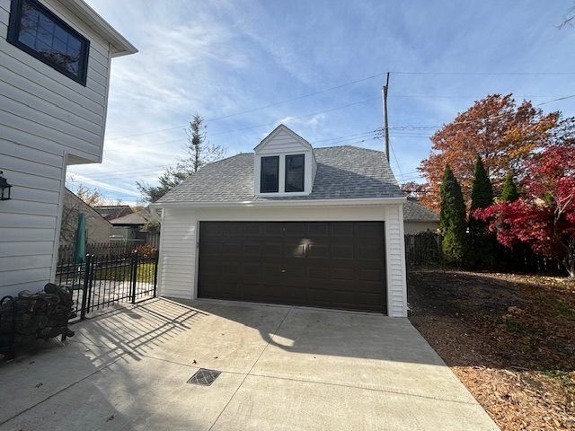 Completed garage exterior restoration after storm damage