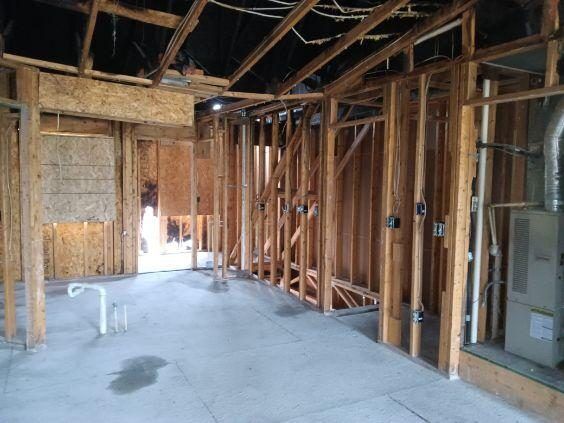 Fire-damaged Michigan home gutted to the studs during smoke restoration and rebuild