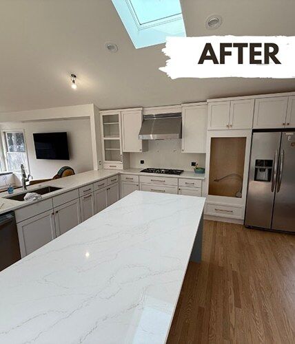 Same space fully rebuilt with a finished kitchen after restoration by DriForce