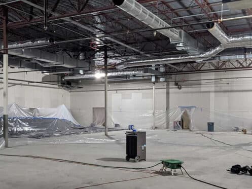 Containment sheeting and HEPA equipment during commercial remediation - DriForce Property Restoration