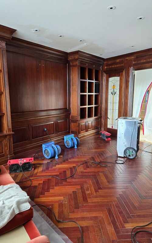 Ceiling water stains and structural drying in a Michigan home after a burst pipe upstairs